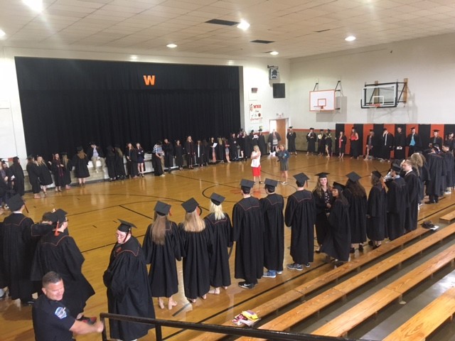 graduates standing in a giant circle